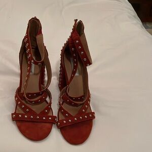 These are special studded rust colored heels